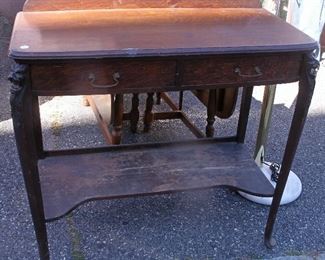 EARLY OAK SERVER WITH CARVED LION HEADS