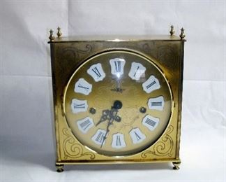 VINTAGE HOWARD MILLER BRASS WIND-UP CLOCK