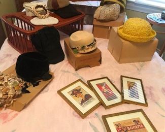 Framed replicas of Broadway playbills and fancy vintage hats to wear to see them