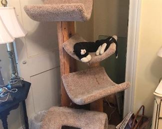 massive cat condo, your cat will love you and also never see you again