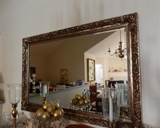 Mirror with ornate frame