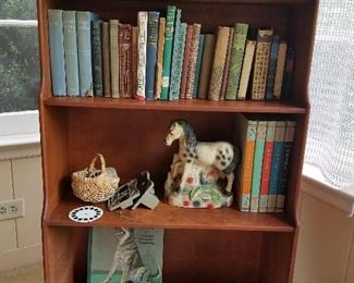 books, cabinet, chalkware