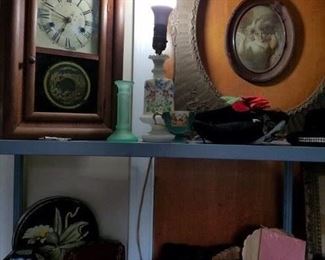 clock, frames, lady's leather gloves, boudoir lamp