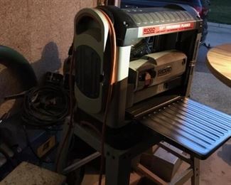 Rigid 13 inch thinkness planer with leg and caster set