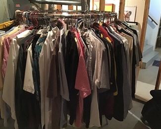 Clothes rack full of men’s clothes. Many designer shirts (M,L,XL)