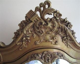 DETAIL OF TOP OF FRENCH CURIO CABINET