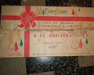 A six-foot aluminum Christmas tree with box