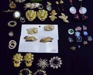 assorted pins, musi tusi's, belt buckels and more