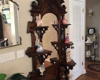 Antique victorian etagere with marble base and hand carved accents 
