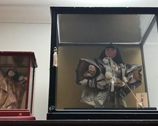 Asian Dolls in Cases.