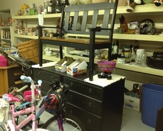 Two black nightstand dresser type cabinets a bench and an upright shelf