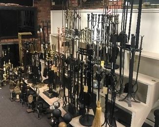 Hundreds of sets of brand new fireplace utensils and andirons, this is only a sampling.  Hundreds more in the warehouse
