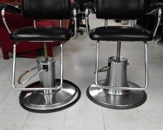 Two Vinyl Covered Barber Salon Chairs