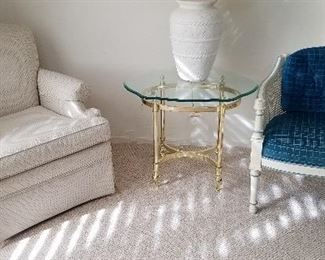 White chair along with a blue and white chair. Great for living room or bedroom. Glass side table.