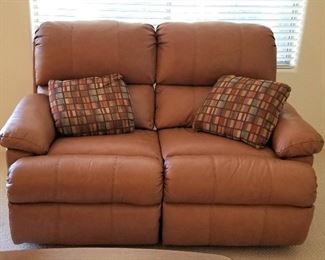 Leather loveseat that reclines