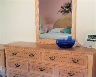 Light colored bedroom furniture; dresser and mirror for sale.