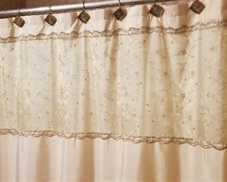 Beautiful shower curtain and rings and pole for sale.