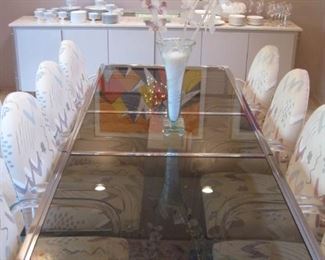 Milo Baughman Chrome Framed Extending Dining Table with 8 Lucite Framed Chairs by Tri-mark/Tulip . Buy them Now for $2,500. 952-261-6461 for viewing.
