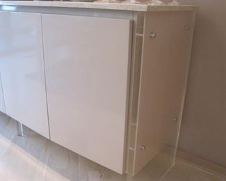 Sideboard/Credenza with Lucite feet & sides and a Marble Top. Likely by Milo Baughman for Thayer Coggin. Buy it Now for $2,500. 952-261-6461 for viewing.