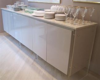 Sideboard/Credenza with Lucite feet & sides and a Marble Top. Likely by Milo Baughman for Thayer Coggin. Buy it Now for $2,500. 952-261-6461 for viewing.