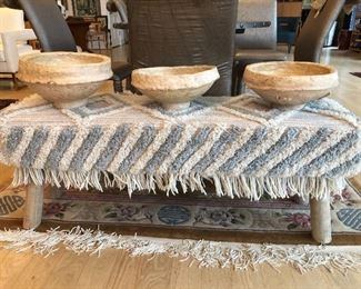 Amazing textile bench with hand made organic form paper mache bowls