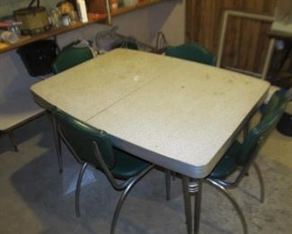 Chrome and Formica table with four chairs
