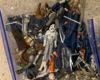 Bags of Star Wars figures (50 in each bag) to be sold per bag to highest bidder. We will be taking silent bids