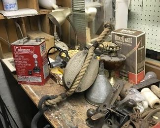 Coleman tin, old pulley, tools