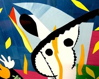 Large Lithograph Of Henri Matisse’s ‘Tristesse du Roi.’ Signature and date 1952 in print in lower right corner. Lithograph is set behind glass in black tone metal frame. Minor chip in glass in upper right and lower right corners. Measures approx 33.75 inches in height by 44.5 inches in width with frame.