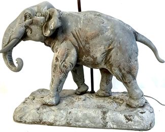Signed, French-made elephant Figural lamp.  Lamp is grey tone metal, possibly iron.  Marching Elephant sculpture is styled after  CHARLES VALTON (French, 1851-1918). Lamp is  inscribed on verso 'Ch. Valton, Copyright 1906 by E.G.’ Coin label reads ‘Fabrication  Francaise, Paris.’ Metal stem attacked to  back. Measures approx 27 inches in height  including stem. Elephant measures approx 13.5  inches in height by 17 inches in width by 8 inches in depth. Lamp has not been tested.  Top finial missing. Color inconsistencies  appear stylistic. Elephant lamp Figural,  animal Figural lamp, interior home decor  lighting, table lamp, elephant animal wildlife sculpture, decorative interior home  decor. animal statuary 7
