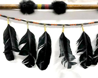 Antique traditional Native American beaded  and leather wrapped carved wooden bow with 2  feathered arrows, decorative weapon. One  arrow has carved stone arrowhead. Gray-brown  tone fur details on bow. Bow Measures approx 43.25 inches in length by 8 inches in height  with bowstring. Arrows have Wear consistent  with age. Antique collectible Native American  weaponry, Native American bow and arrows,  hand-crafted bow and arrows, tribal art, collectible antique weaponry, decorative  display accessory. 