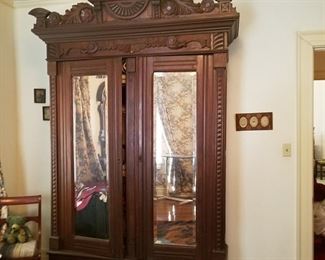 Gorgeous antique mirrored armoire cabinet
