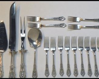 82 pieces of Wallace Sterling Silverware in the Rose Point Design. 