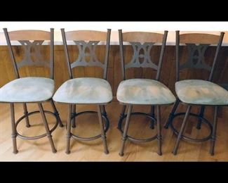 42 inch tall Trica, Inc. made in Canada. Suede and Steel Bar Stools.