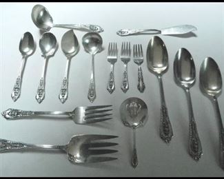 82 pieces of Wallace Sterling Silverware in the Rose Point Design. 