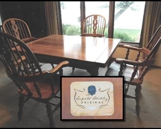Leopold Stickley Dining Room Table with Four Captain's Chairs.  54" by 30" when closed. Opens up to 8' by 30".