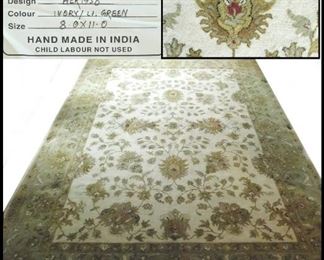 8' by 11' Heritage Carpet. Handmade in India.