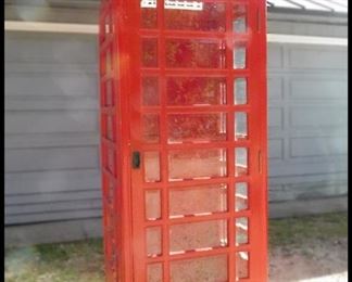Full size replica of an English Phone Booth. Measures 30" x 30" x 90". 72 Beveled Glass Panes. Great to use at parties for people to use their cell phones. Can also be used as a curio cabinet. 