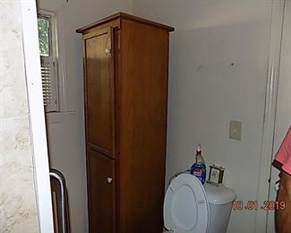 Oak bathroom storage cabinet