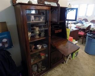 Secretary 12x43x67, five shelves, glass doors over secretary, cabinet below