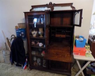 Secretary 12x43x67, five shelves, glass doors over secretary, cabinet below