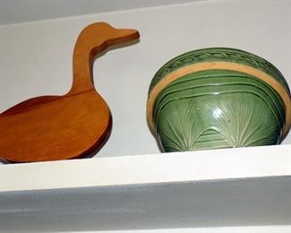 crockery bowl and wooden duck