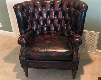 one of a pair of large leather chair