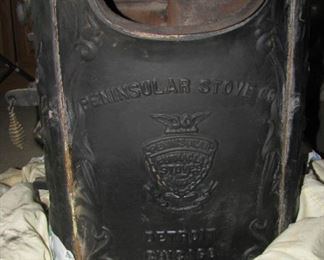 Peninsular Stove Co. cast iron stove