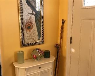 Nice white cabinet. We have two matching peacock photos 