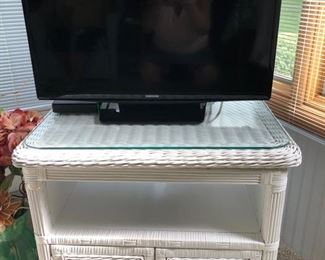27 inch TV set and wicker stand