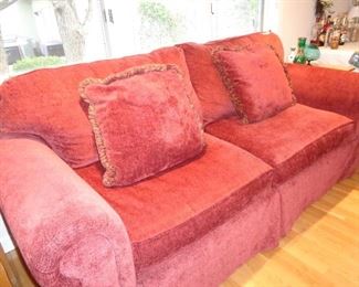 love this sofa, its more of a rusty red color, not pink