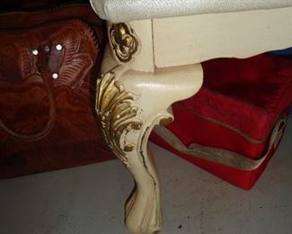 closeup of leg on vanity & stool