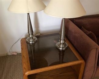 End table with glass top plenty of storage with two brushed chrome lamps