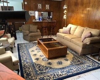 Rug Including one very similar but much larger in the garage